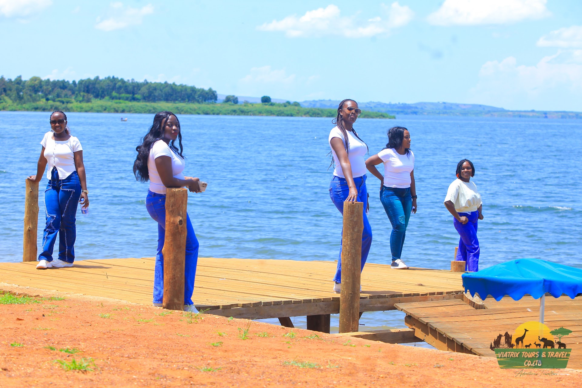 Viatrix travelers beside the water