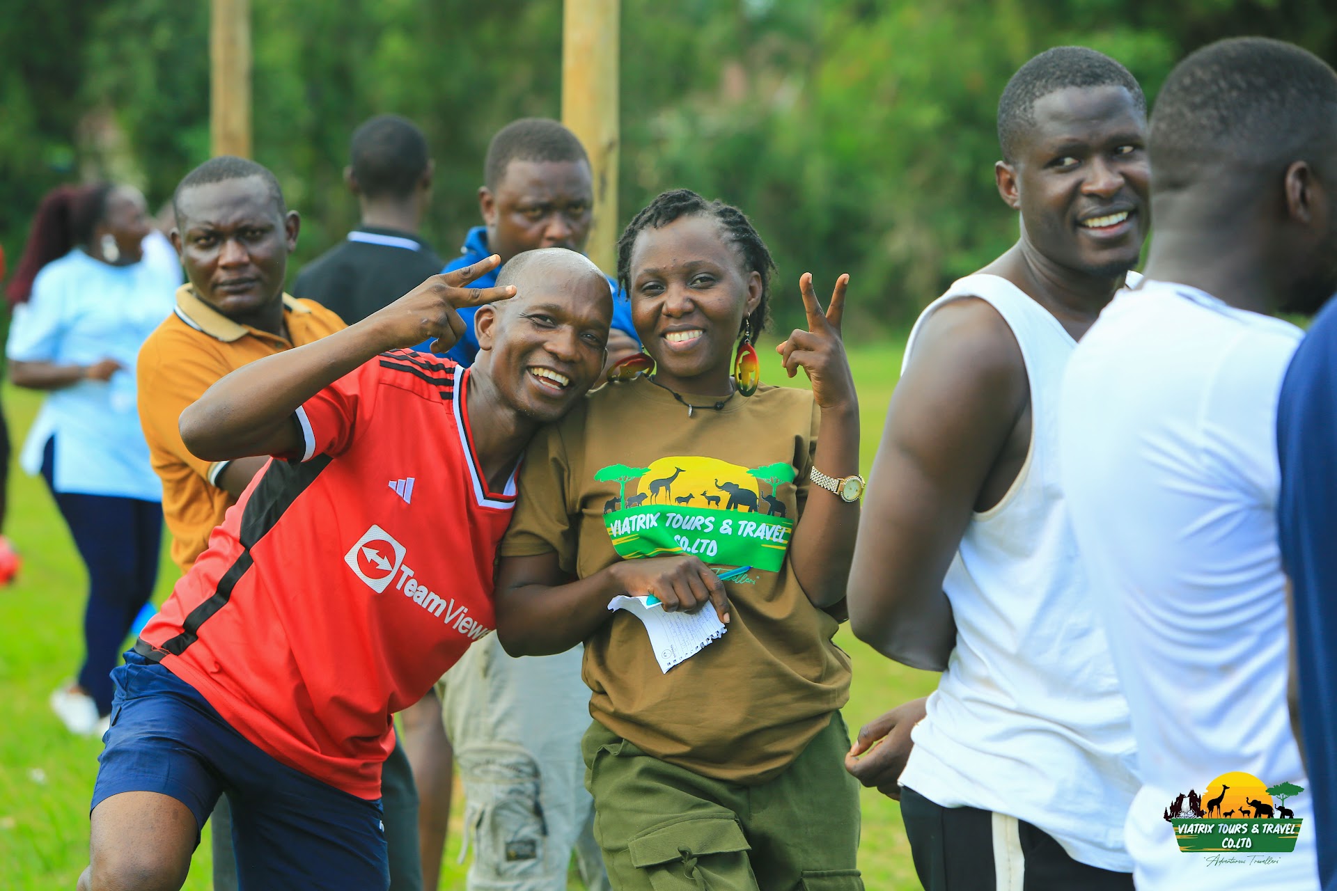 Viatrix guests smiling during an outdoor event